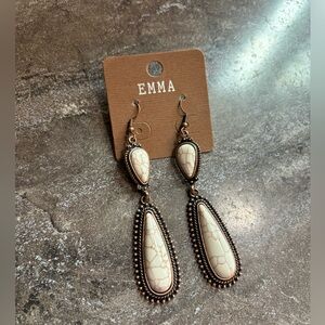White buffalo ear rings. NWT